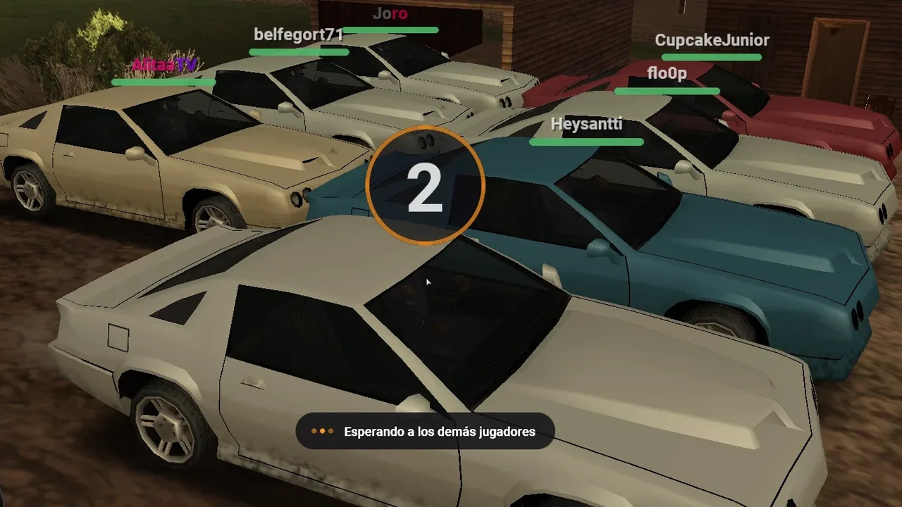 Siete autos en la largada de un evento, con la cuenta regresiva en 2